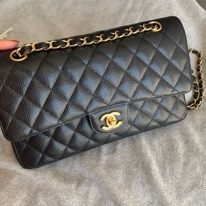 Chanel Classic flap, medium size, black and gold hardware, caviar leather